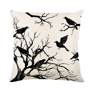 Linen Halloween pillow case with black ink crow and tree pattern on cream background
