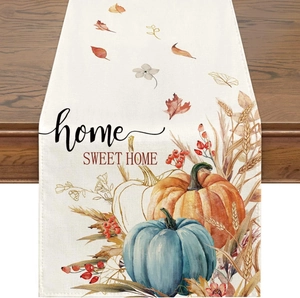 Linen table runner with autumn pumpkins, maple leaves and Home Sweet Home lettering