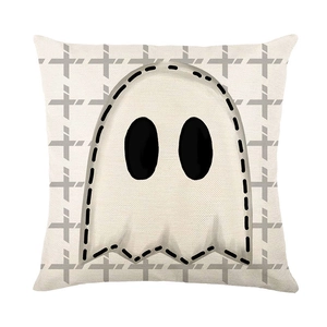 Close-up of Halloween ghost pillowcase showing linen texture and black stitched details