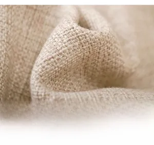 Macro shot showing high-quality durable natural linen fabric with dense weaving texture
