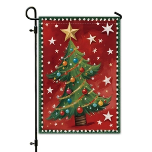 Detail of Christmas garden flag featuring a decorated tree and stars on red background