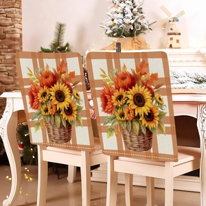 Detail of harvest pumpkin and maple leaf print on linen-style dining chair covers