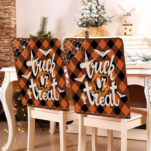 Detail of Halloween argyle chair covers with Trick or Treat print and spider web motifs