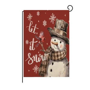 Detail of Christmas garden flag with snowman and cardinal motif and metal holder