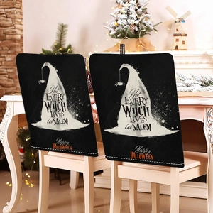 Detail of Halloween chair covers featuring a black wizard hat and festive typography