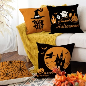 Cozy home setting showing four linen Halloween pillowcases with pumpkin and ghost motifs