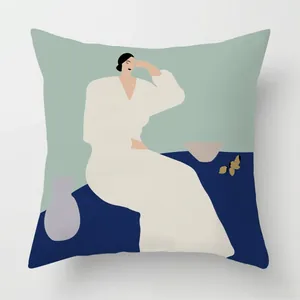 Detail of Nordic minimalist pillow cover showing textured fabric and abstract female illustration
