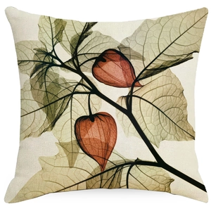Close-up of linen pillowcase featuring artistic olive green leaf and red berry prints