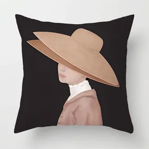 Close-up of Nordic cushion cover featuring artistic minimalist female illustration on black