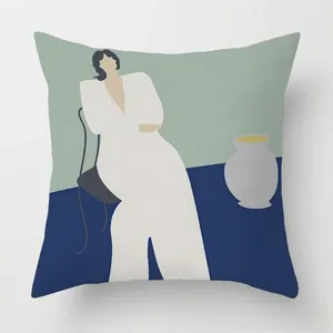 Detail of artistic throw pillow cover with abstract hand-painted woman design