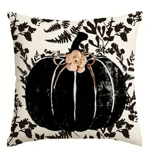 Square fall pumpkin pillow cover with black fern pattern and pink floral accent