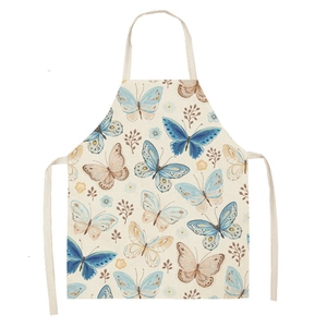 Detail shot of sleeveless apron with blue and brown watercolor butterfly and floral prints
