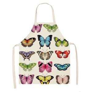 Artistic butterfly print kitchen apron with colorful patterns on cream fabric