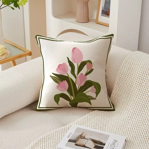 Detail of floral tulip print on high-quality twill fabric of a luxury throw pillow case