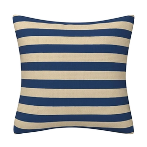 Detail of navy blue and beige striped linen pillowcase showing fabric texture and seams
