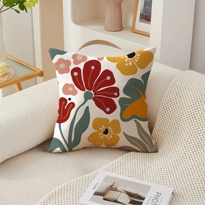 Vintage floral throw pillow cover on a white sofa with elegant American country style
