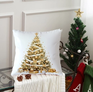 Close-up of golden Christmas tree and gift patterns on white festive cushion cover