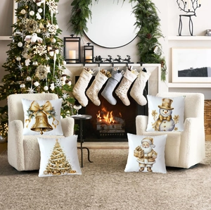 Set of four Christmas pillow covers with gold Santa and snowman prints on white fabric