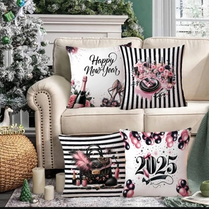Detail showing set of four 2025 Happy New Year cushion covers on a beige leather sofa