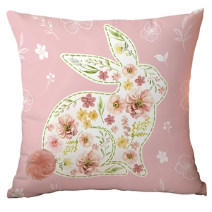 Pink Easter pillow cover with floral bunny design and 3D plush pom-pom tail detail