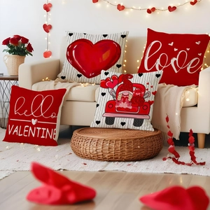 Detail showing four Valentine's Day pillow covers with red hearts and gnome motifs