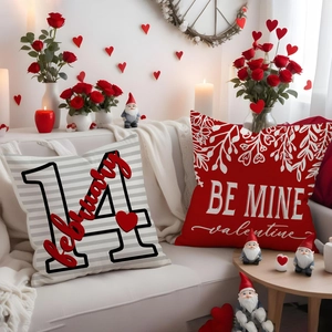 Detailed view of red Valentine's Day pillow covers with romantic heart and gnome decorations