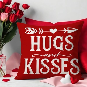 Red Hugs and Kisses Valentine pillow cover with heart arrow on white wooden surface
