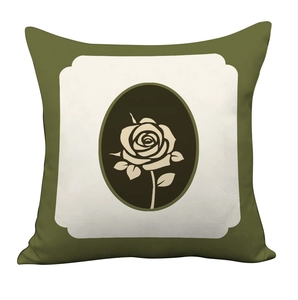 Close-up of vintage dark olive green pillow cover with elegant cream rose floral pattern