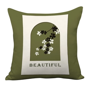 Detail of olive green pillow cover featuring vintage floral print and 'BEAUTIFUL' text