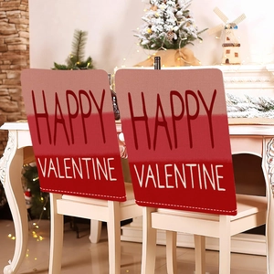 Detail of red and pink Happy Valentine chair cover with premium linen texture for wedding decor