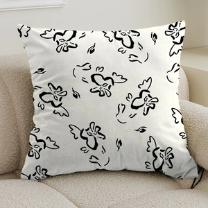 Detail of French cream style pillowcase with black abstract pattern on white twill fabric