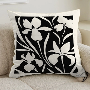 French cream style throw pillow with black and white iris silhouette pattern