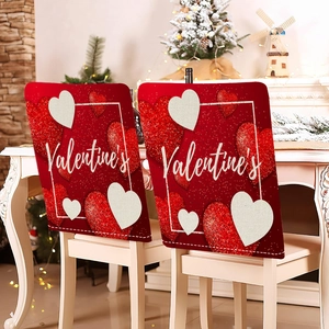 Detail of red Valentine's Day chair covers with white heart print and rustic texture