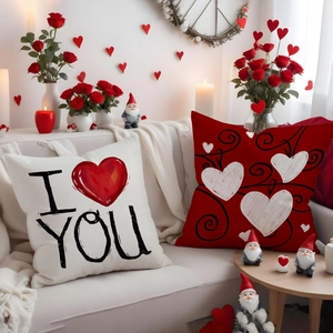 Detail of Valentine's linen pillow set with I Love You text and heart patterns
