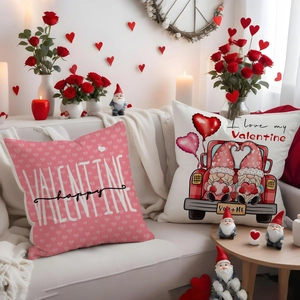 Detail view of Valentine's Day pillow covers with romantic pink and white festive prints