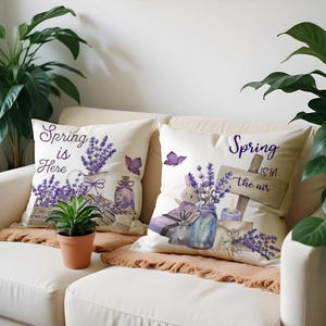 Spring lavender pillow covers with watercolor rabbit print on a cozy fabric sofa