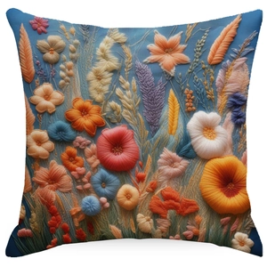 Close-up of vibrant floral embroidery texture on a blue square decorative cushion cover