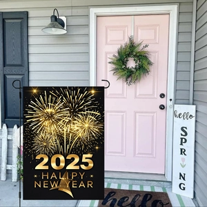 Detail of 2025 Happy New Year garden flag with gold fireworks on black polyester fabric