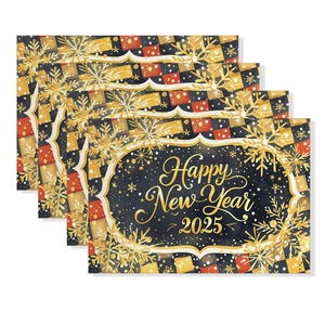 Close-up of 4-piece black and gold 2025 New Year placemats with snowflake patterns