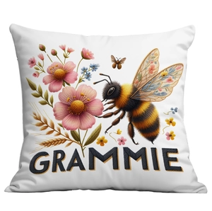 Detailed view of the bee and flower embroidery print with Grammie text on a white pillowcase