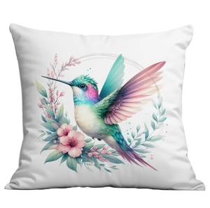 Close-up of hummingbird and floral print on white cushion cover with watercolor style