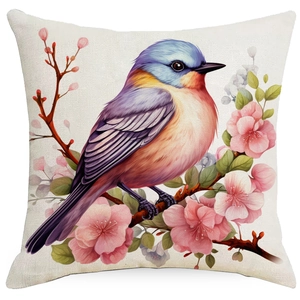 Detail of bird and pink cherry blossoms print on square linen decorative pillowcase