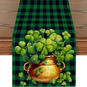 Detail of St. Patrick's Day table runner with green buffalo plaid and lucky shamrock pot