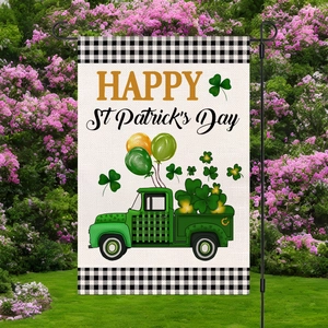 Outdoor garden flag detail showing a retro green truck and St. Patrick's Day shamrocks