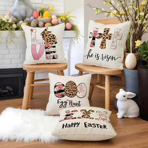 Detailed view of four Easter bunny throw pillow covers in a cozy home fireplace setting