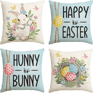 Detail view of four linen Easter pillow covers with bunny and egg illustrations