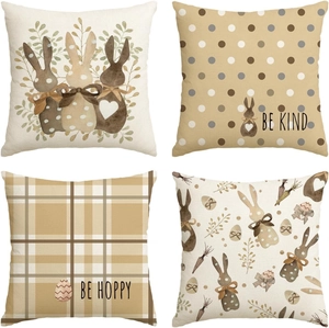 Set of four Easter linen pillow covers with bunnies, eggs and carrots patterns