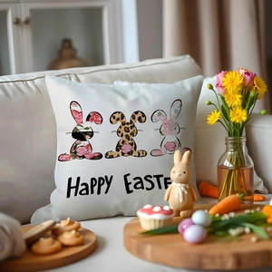 Happy Easter linen pillow case featuring floral bunny silhouettes on a cozy white sofa