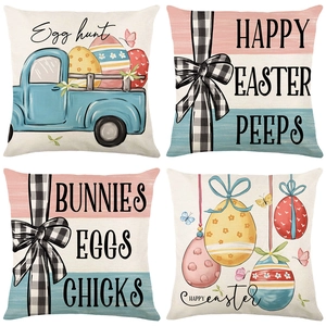 Detail of four Easter linen pillow covers with bunny, eggs and blue truck patterns