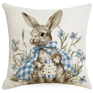 Detailed close-up of Easter rabbit and blue bow print on square linen pillowcase